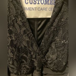 Black capped sleeve cocktail dress. Black. Size 4 petite Worn twice. Dry cleaned